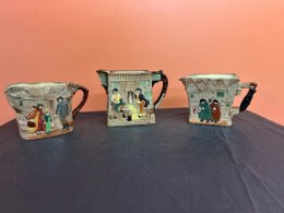 63. Three (3) Royal Doulton Pitchers - Old London - The Pickwick Papers - Peggotty