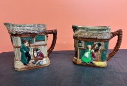 66. Two (2) Royal Doulton Pitchers - Oliver Twist - Old Curiosity Shop