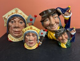 133. Four (4) Royal Doulton Jugs - (2) Punch & Judy - (2) Red Queen